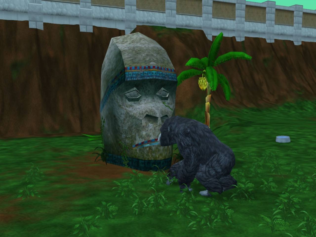 A gorilla beside a carved stone shelter in Zoo Tycoon 2.